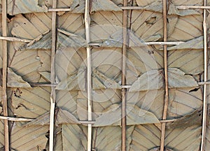 Dry leaves and weaved bamboo for background