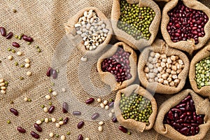 Dry legumes seed on linen fabric background