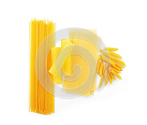 Dry macaroni in various shapes, pasta, lasagna, farfalle, spaghetti, rigatoni, penne isolated on background. Traditional italian