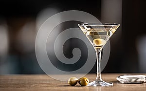 Dry Martini short drink cocktail with gin, dry vermouth and an olive garnish