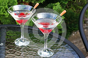 Dry Martinis with red cherries