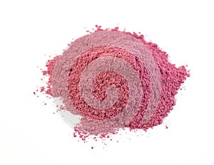 Dry matcha pink tea powder isolated on white background