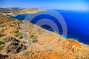 Dry mediterranean country, sea and village Panormos at Crete island in Greece