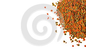 Dry multi-colored compound fish feed flakes in a transparent box on White background. Top view