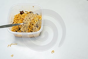 Dry noodle in the food box on white background