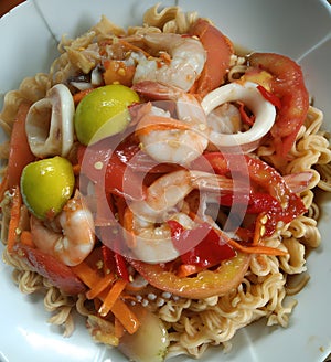 dry noodle with seafood salad