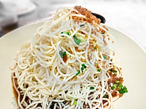 Dry noodles with meat paste photo