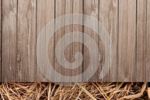 Dry old hay with old rustic wooden plank floor top view