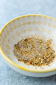 Dry Organic Adobo Pork Seasoning in a Bowl / Dried Spices