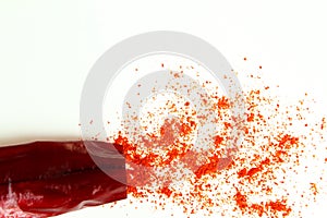 dry organic kashmiri red chili pepper and chili pepper powder isolated on white  background selective focus,well known for dark r