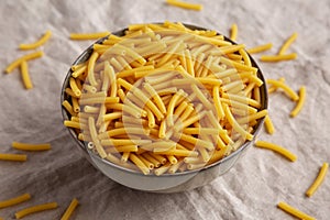 Dry Organic Maccheroni Pasta in a Bowl, side view