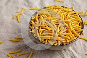 Dry Organic Maccheroni Pasta in a Bowl, side view