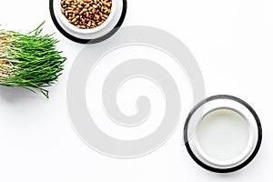 Dry pet - cat food in bowl on white background top view mock up