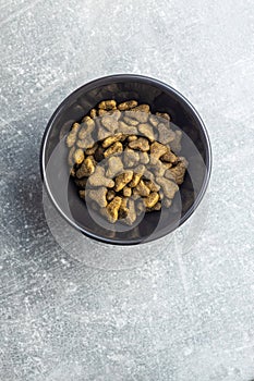 Dry pet food. Kibble dog or cat food