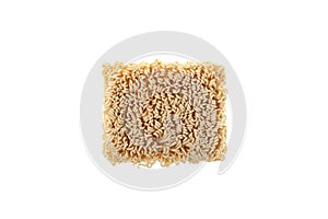 Dry pressed instant noodles on white background. Ramen noodles