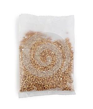 Dry Raw Buckwheat Grains in Boiling Package for Cooking Isolated