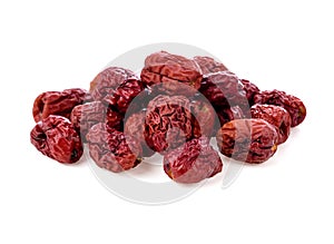 Dry red jujubes isolated on white