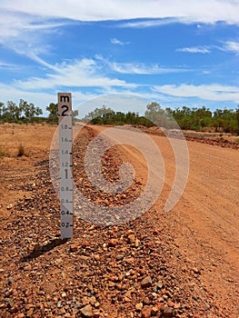 Dry river bed depth gauge in outback Australia