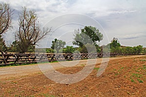 River Border Fence Separating the US from Mexico Near Nogales, Arizona photo