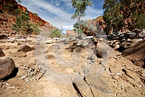 Dry river bed at Western MacDonnell Ranges photo