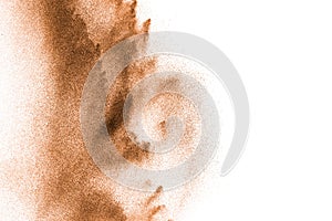 Dry river sand explosion. Brown color sand splash against white background