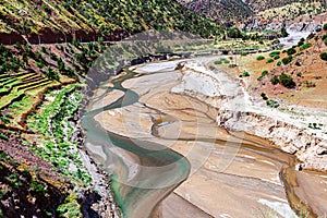 Dry riverbed in mountain valley. Morocco