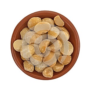 Dry roasted and salted macadamia nuts in a bowl