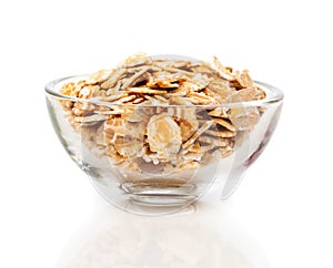 Dry rolled oatmeal in bowl, isolated