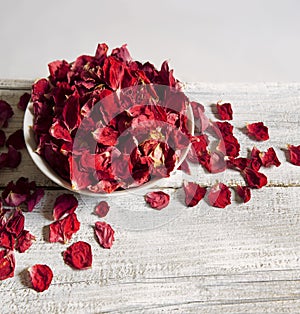 Dry rose petals in a bowl