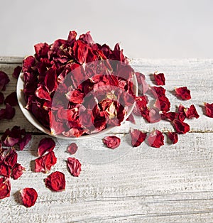 Dry rose petals in a bowl photo