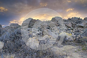 Dry rugged sand colored rock boulders of the Owyhees in southwestern Idaho photo