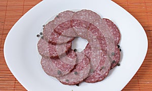 Dry salami whit black pepper