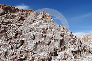 Dry salt hills in Valle de la Luna, Moon valley in San Pedro de Atacama desert