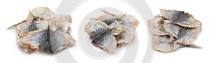 Dry salted yellowstripe scad. Dried small fish isolated, selaroides snack, stockfish beer snacks, dried flat fillet photo