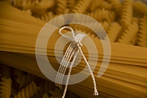 Dry spaghetti cuisine on wooden background ingredient, uncooked