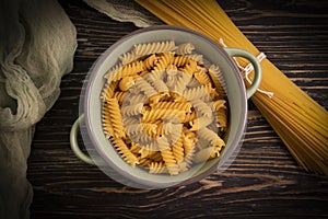 Dry spaghetti on wooden background noodle food delicious