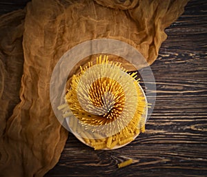 Dry spaghetti on wooden background various  delicious  cuisine pasta nutrition uncooked