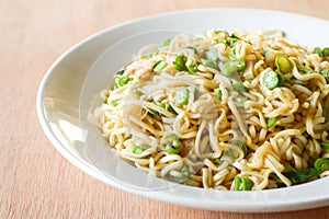 Dry spicy noodle food on white dish