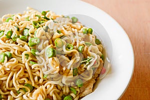 Dry spicy noodle food on white dish