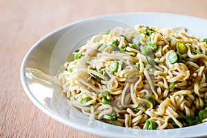 Dry spicy noodle food on white dish