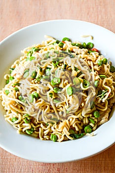 Dry spicy noodle food on white dish