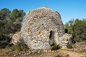 Dry stone shelter in Catalonia, Spain photo