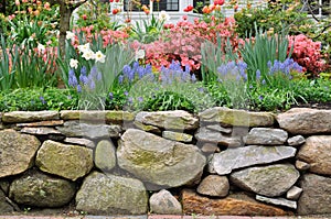 Dry Stone Wall and Colorful Garden photo