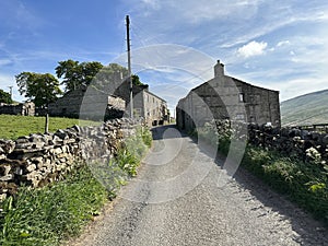 Dry stone walls, and old cottages in, Hardraw, Hawes, UK