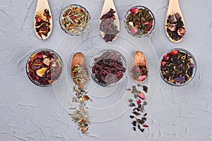 Dry tea collection on gray background.