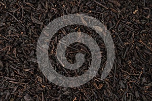 Dry tea leaves background or texture, black tea pattern