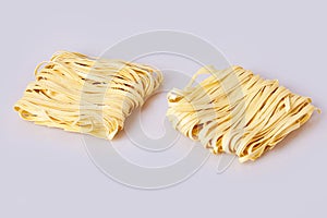 Dry thick rolled noodles square shape. Capelli d`angelo, Angel`s hair - pasta.