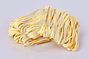 Dry thick rolled noodles square shape. Capelli d`angelo, Angel`s hair - pasta.