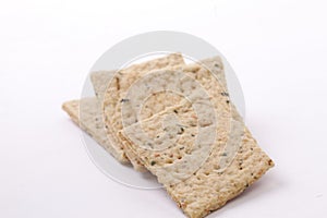 Dry thin lemon leaves crackers. Tasty crispy crackers isolated on white