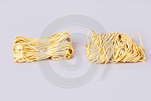Dry thin rolled noodles square shape. Capelli d`angelo, Angel`s hair - pasta.